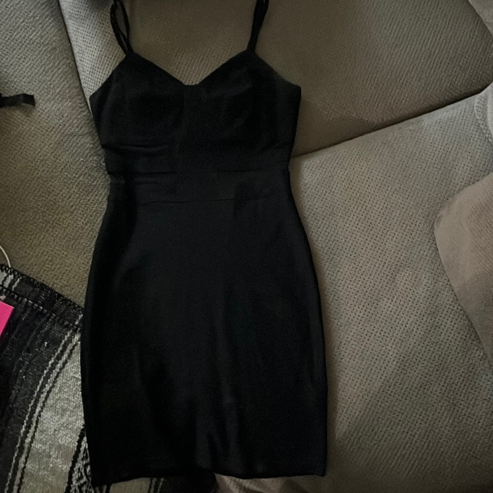 Beautiful black dress with illusion cut outs on waist